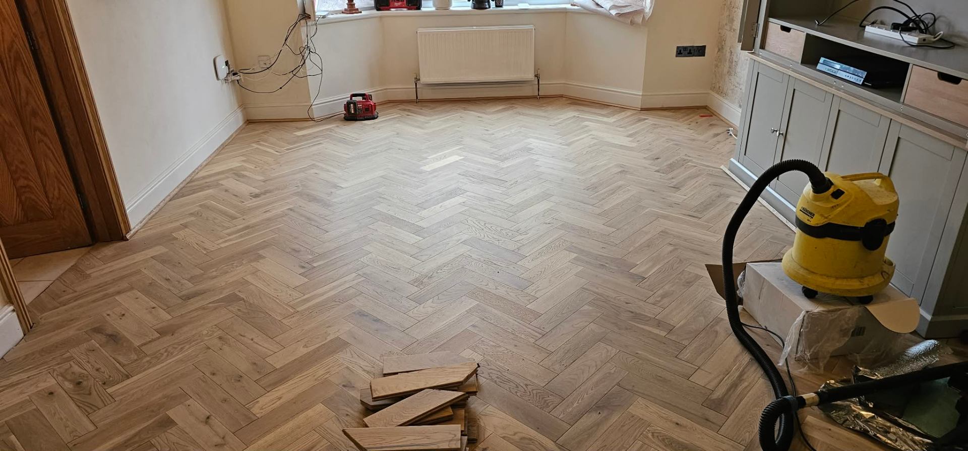 Herringbone parquet — natural oak completed by IDL Property Services