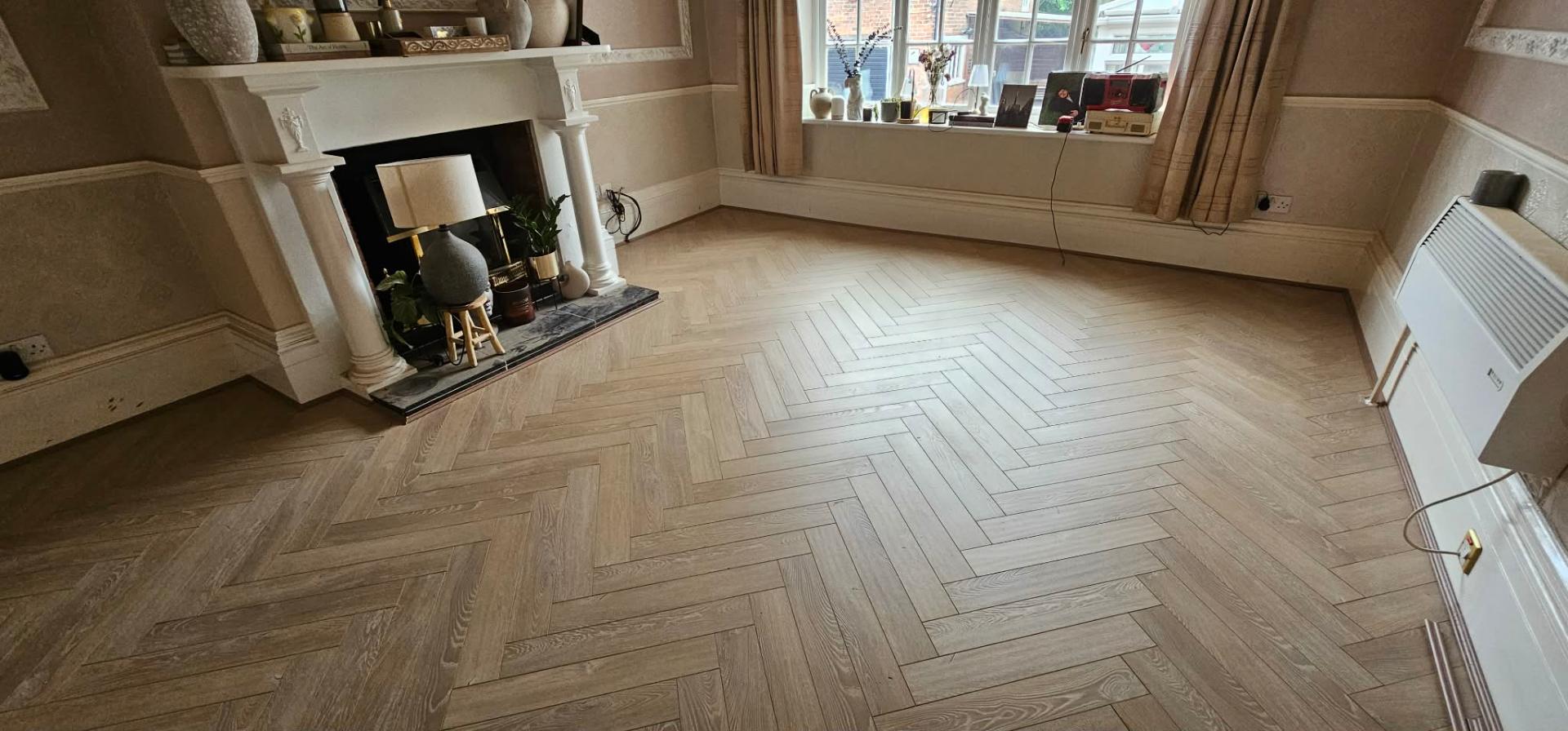 Herringbone parquet — light oak completed by IDL Property Services